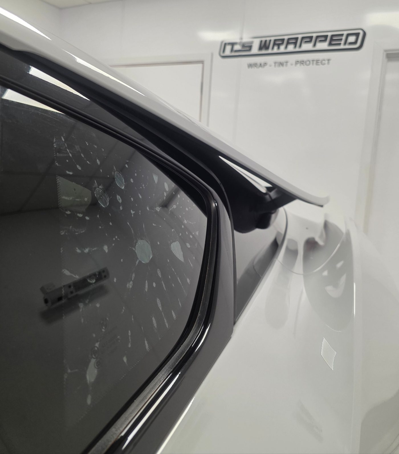 BMW i8 windows being tinted Cardiff IT's Wrapped