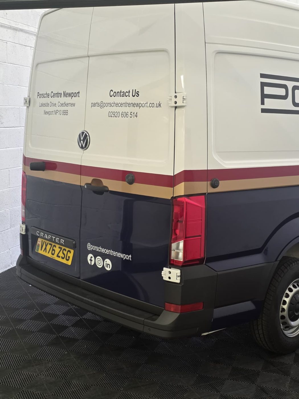 Porsche Centre Newport van rear doors signwriting and contact details